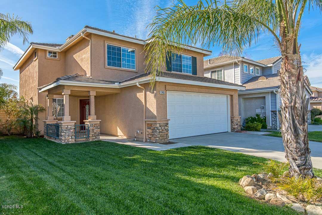 1745 Empty Saddle Road Simi Valley, CA 93063 - Photo 1 of 29 a view of a house with a yard and plants