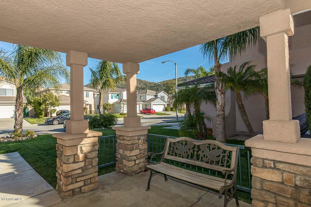 1745 Empty Saddle Road Simi Valley, CA 93063 - Photo 2 of 29 a front view of a house with a garden