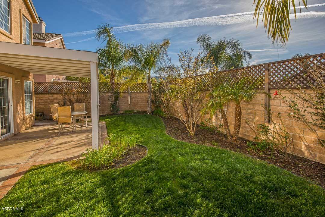 1745 Empty Saddle Road Simi Valley, CA 93063 - Photo 25 of 29 front view of a house with a yard