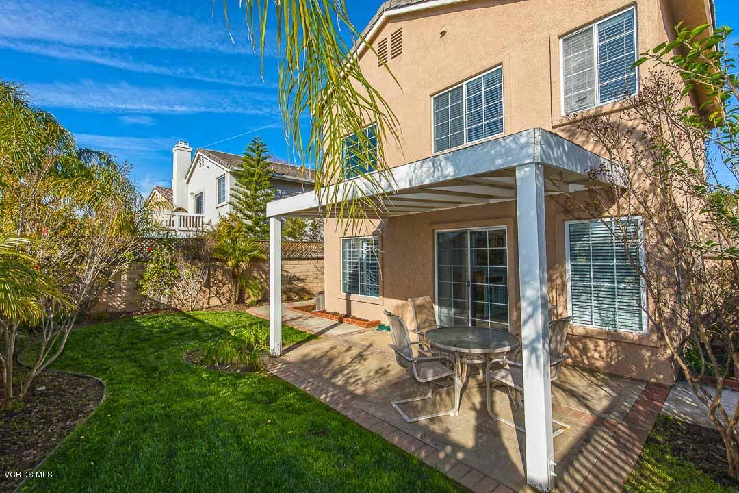 1745 Empty Saddle Road Simi Valley, CA 93063 - Photo 27 of 29 a view of a house with backyard