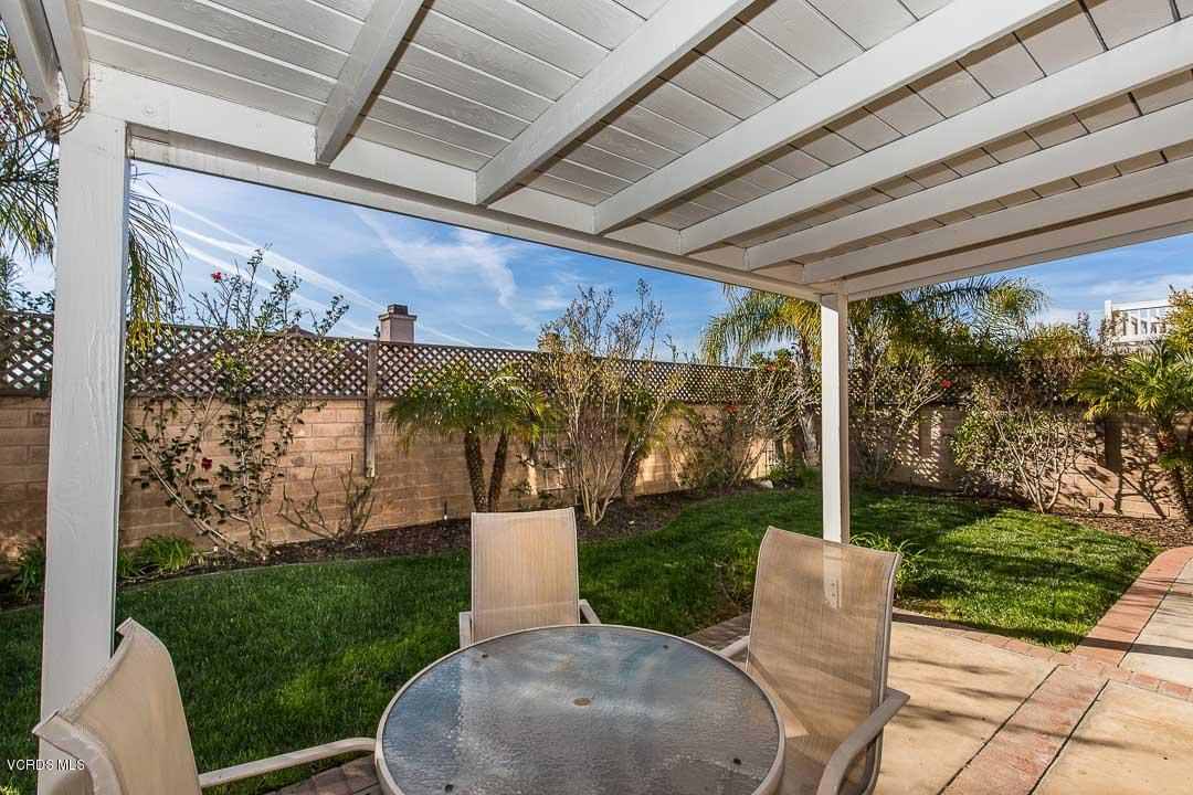 1745 Empty Saddle Road Simi Valley, CA 93063 - Photo 28 of 29 a view of a patio with a table and chairs
