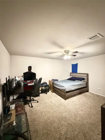 a bedroom with furniture