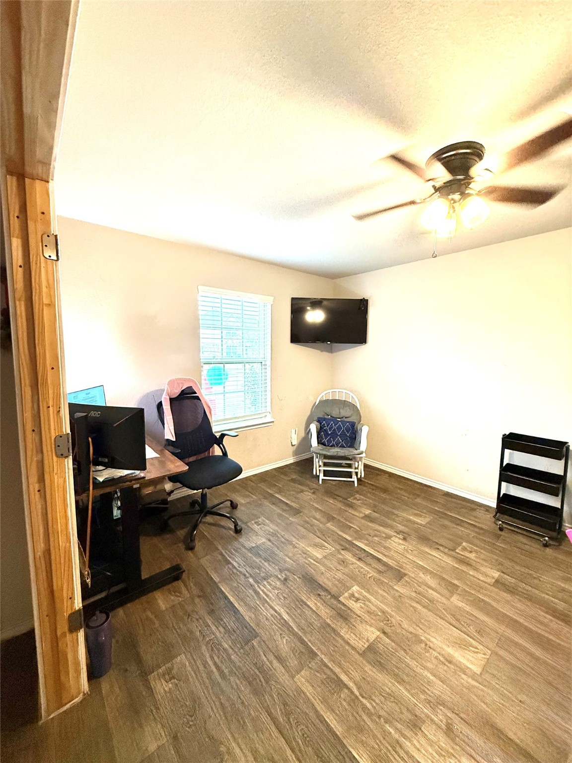 15418 Rancho Plata Drive Channelview, TX 77530 - Photo 19 of 20 a view of a workspace with furniture and a window