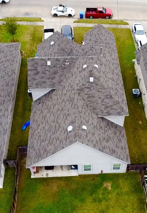 15418 Rancho Plata Drive Channelview, TX 77530 - Photo 20 of 20 a view of a swimming pool with a yard