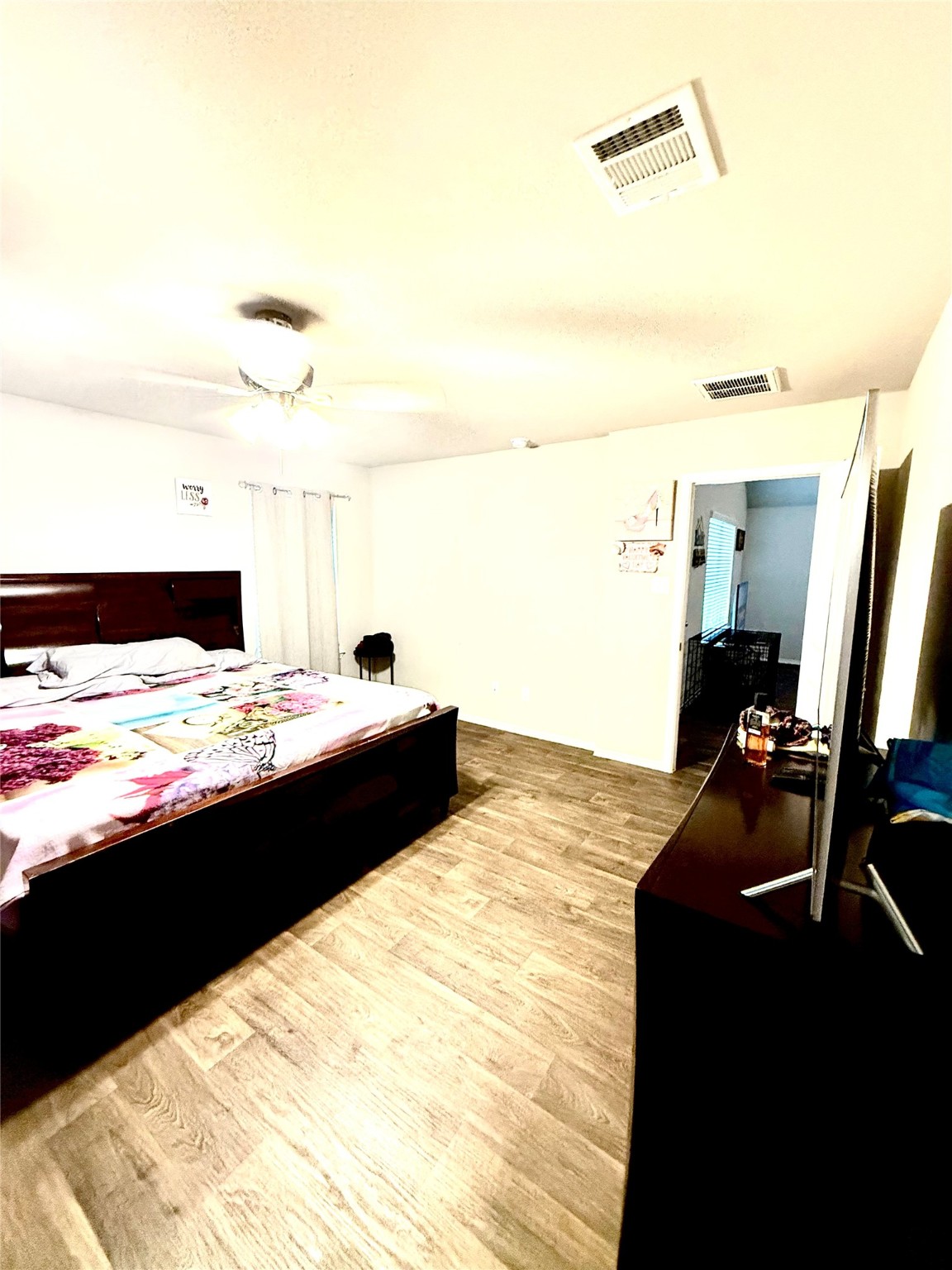 15418 Rancho Plata Drive Channelview, TX 77530 - Photo 7 of 20 a kitchen with a sink and a refrigerator