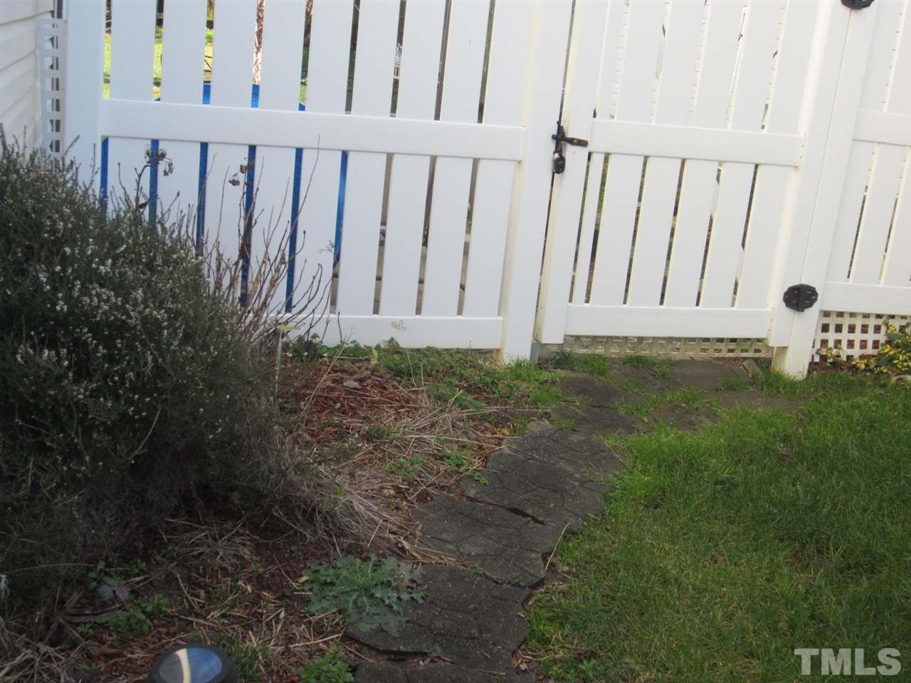 9901 Treymore Drive Raleigh, NC 27617 - Photo 16 of 25 a view of a backyard