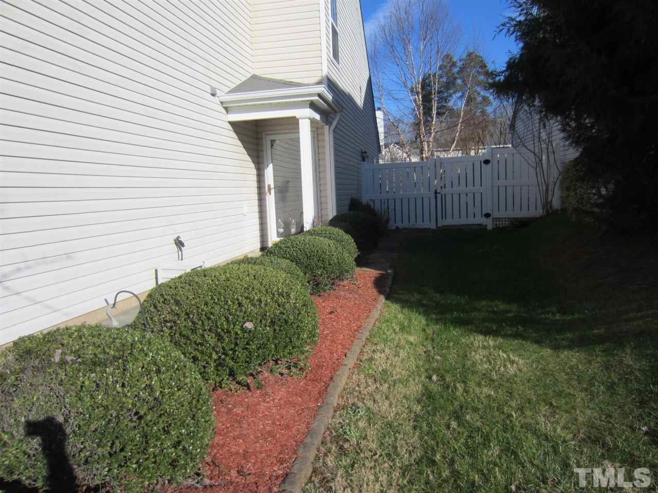 9901 Treymore Drive Raleigh, NC 27617 - Photo 8 of 25 a house view with a backyard space