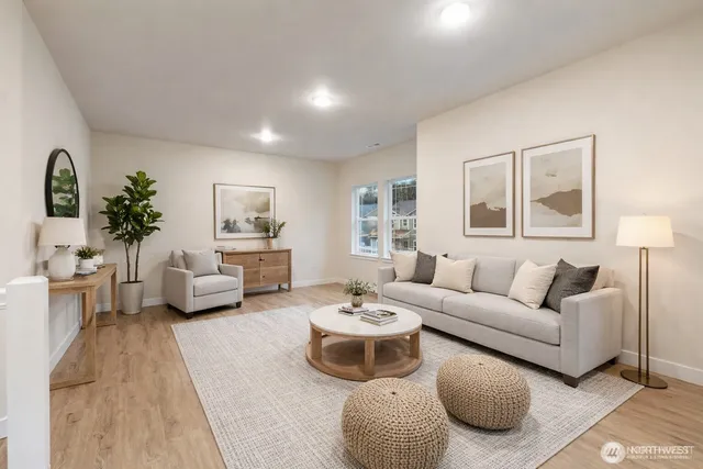 a bedroom with a bed and a couch