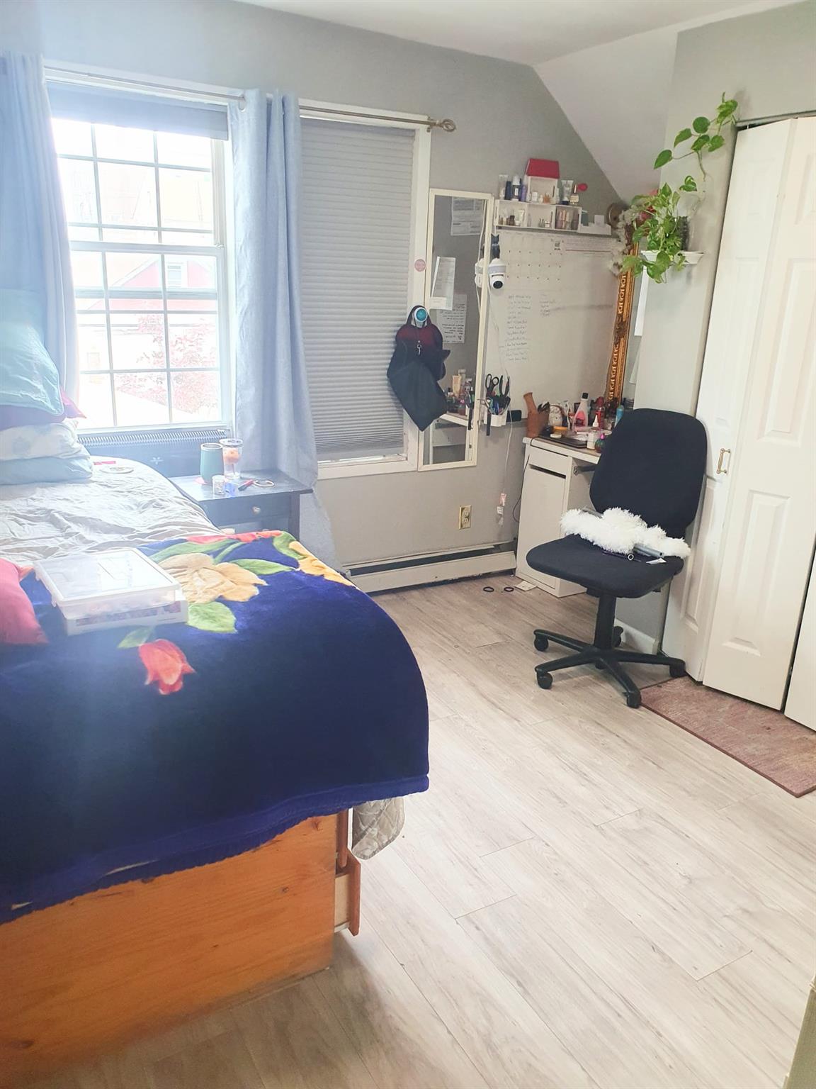 128-26 Gotham Road Queens, NY 11420 - Photo 11 of 16 a living room with furniture and a table