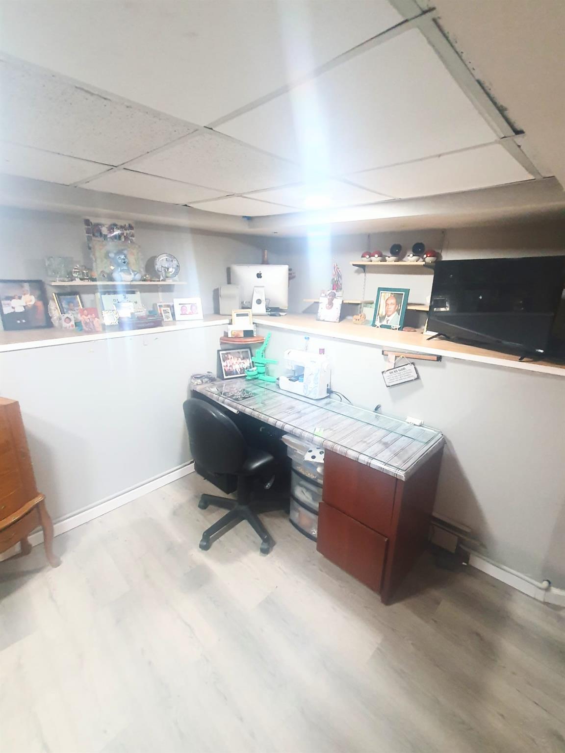 128-26 Gotham Road Queens, NY 11420 - Photo 13 of 16 a living room with stainless steel appliances kitchen island granite countertop furniture and a kitchen view