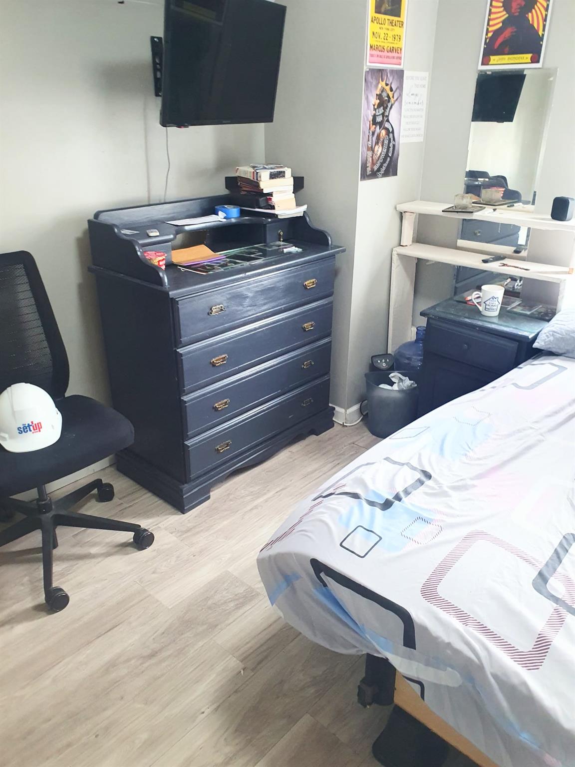 128-26 Gotham Road Queens, NY 11420 - Photo 14 of 16 a room with a chair and a table