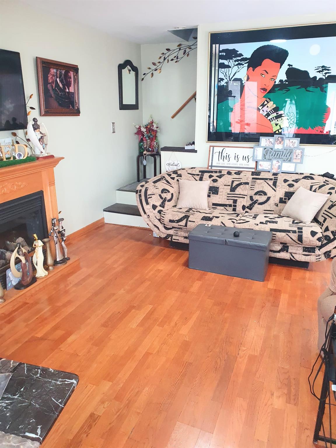 128-26 Gotham Road Queens, NY 11420 - Photo 4 of 16 a bedroom with an bed and painting on the wall