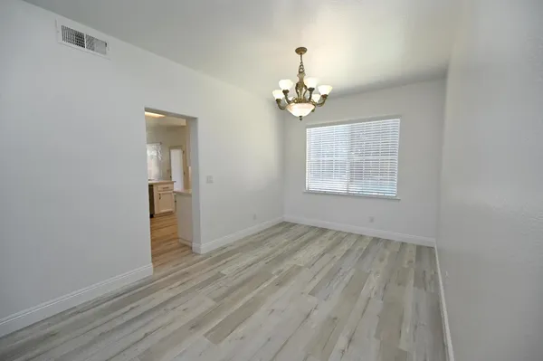 a bathroom with a sink a vanity and mirror
