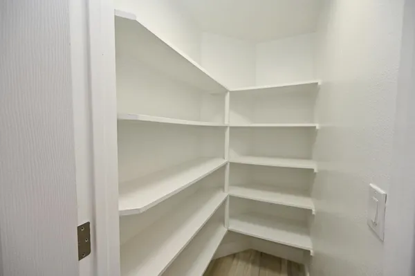 a view of hallway with windows