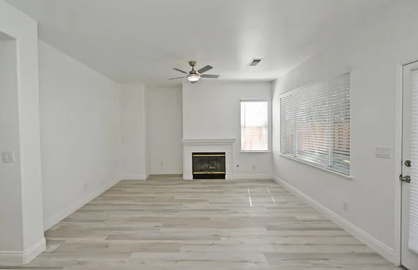 a view of a chair and table in the balcony