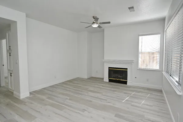 a view of a wooden fence