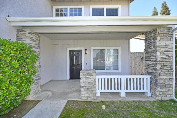 front view of a house with a porch
