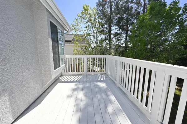 a view of swimming pool with a patio