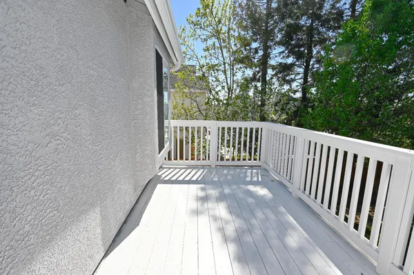 a view of a swimming pool with a sitting area