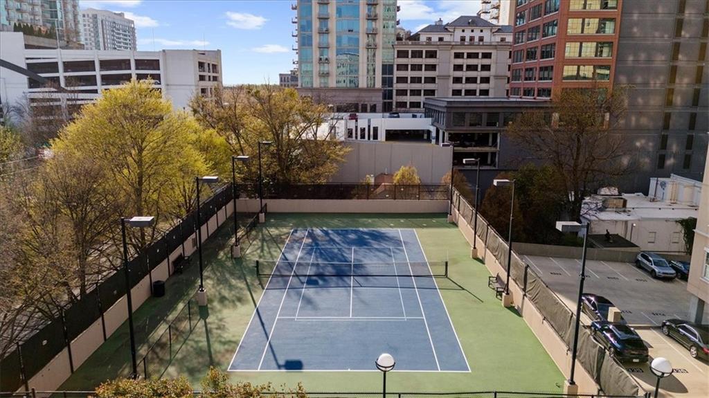 325 East Paces Ferry Road Northeast, Unit 504 Atlanta, GA 30305 - Photo 26 of 45 a view of a balcony with chairs