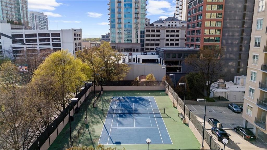 325 East Paces Ferry Road Northeast, Unit 504 Atlanta, GA 30305 - Photo 27 of 45 a view of a balcony with sitting area
