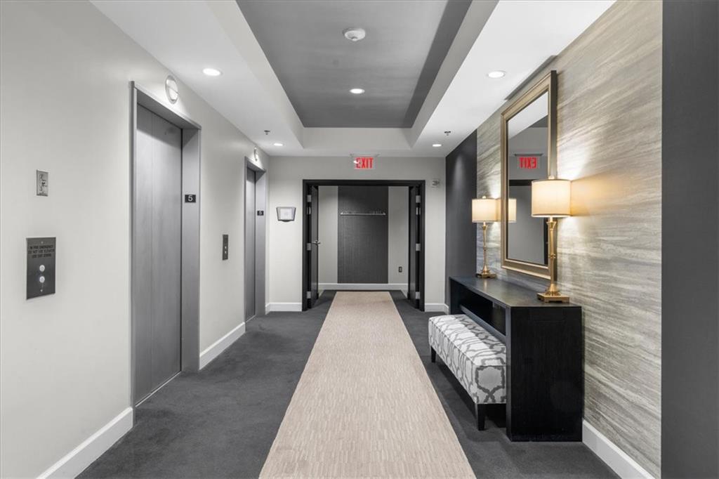 325 East Paces Ferry Road Northeast, Unit 504 Atlanta, GA 30305 - Photo 40 of 45 a view of hallway with view of bathroom