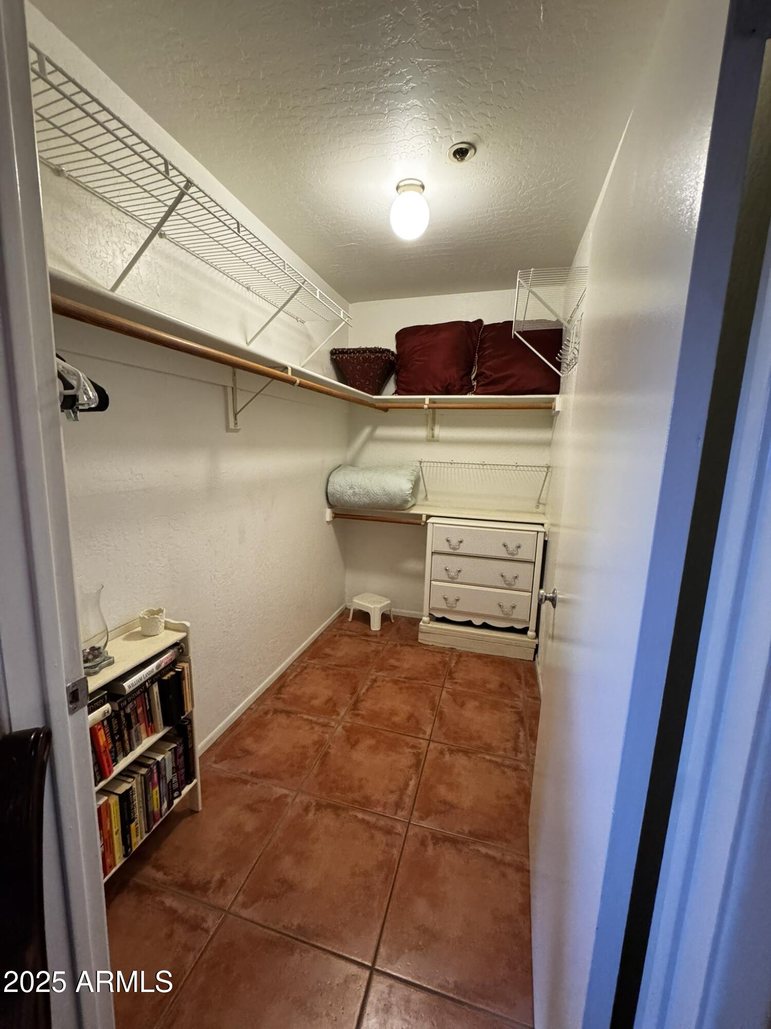 12123 West Bell Road, Unit 337 Surprise, AZ 85378 - Photo 33 of 50 a room with storage and utility