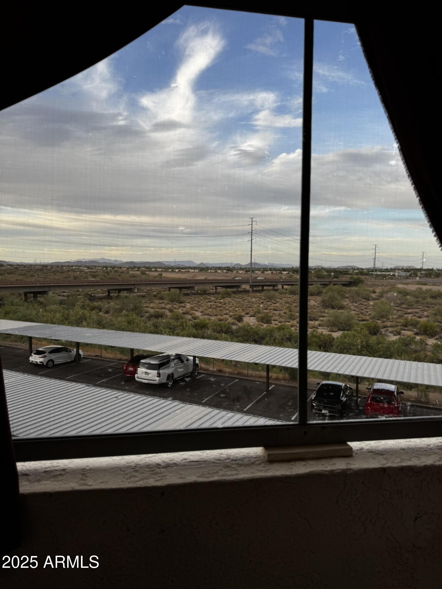 12123 West Bell Road, Unit 337 Surprise, AZ 85378 - Photo 36 of 50 a view of a balcony next to a yard