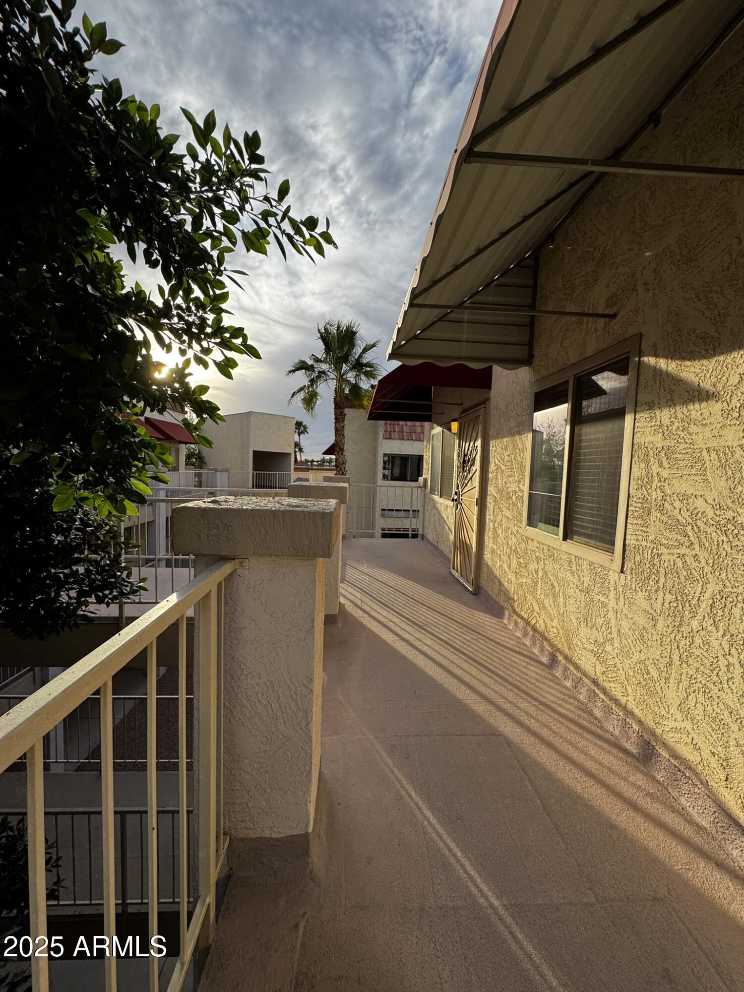 12123 West Bell Road, Unit 337 Surprise, AZ 85378 - Photo 46 of 50 a view of a balcony with chairs