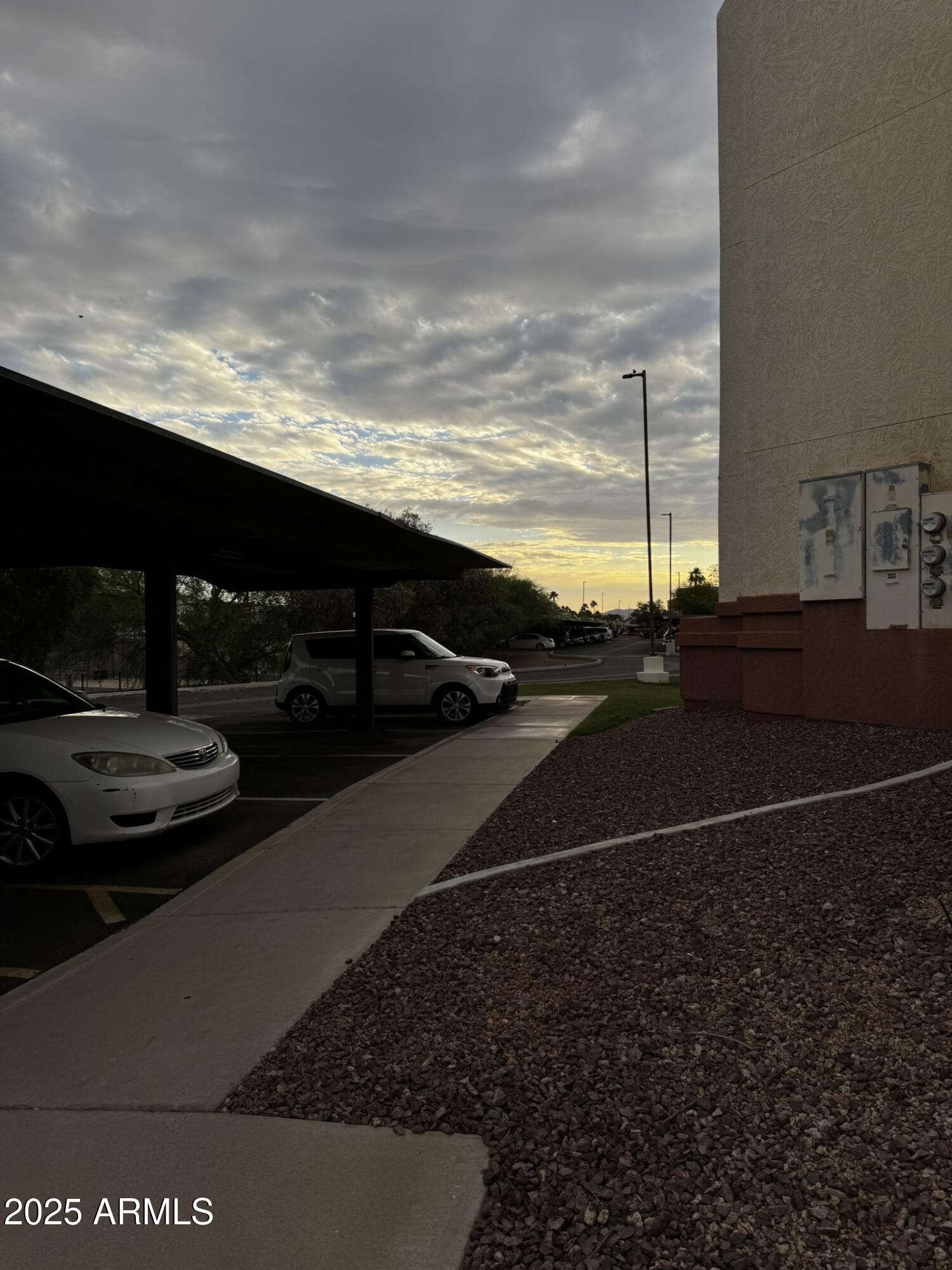 12123 West Bell Road, Unit 337 Surprise, AZ 85378 - Photo 48 of 50 a view of street with view of car parked