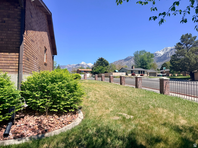 12080 Mill Ridge Circle Sandy, UT 84094 - Photo 4 of 56 Brick exterior with a gabled roofline