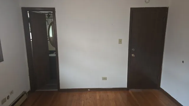 a bathroom with a toilet and a sink