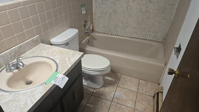 a view of an empty room and wooden floor