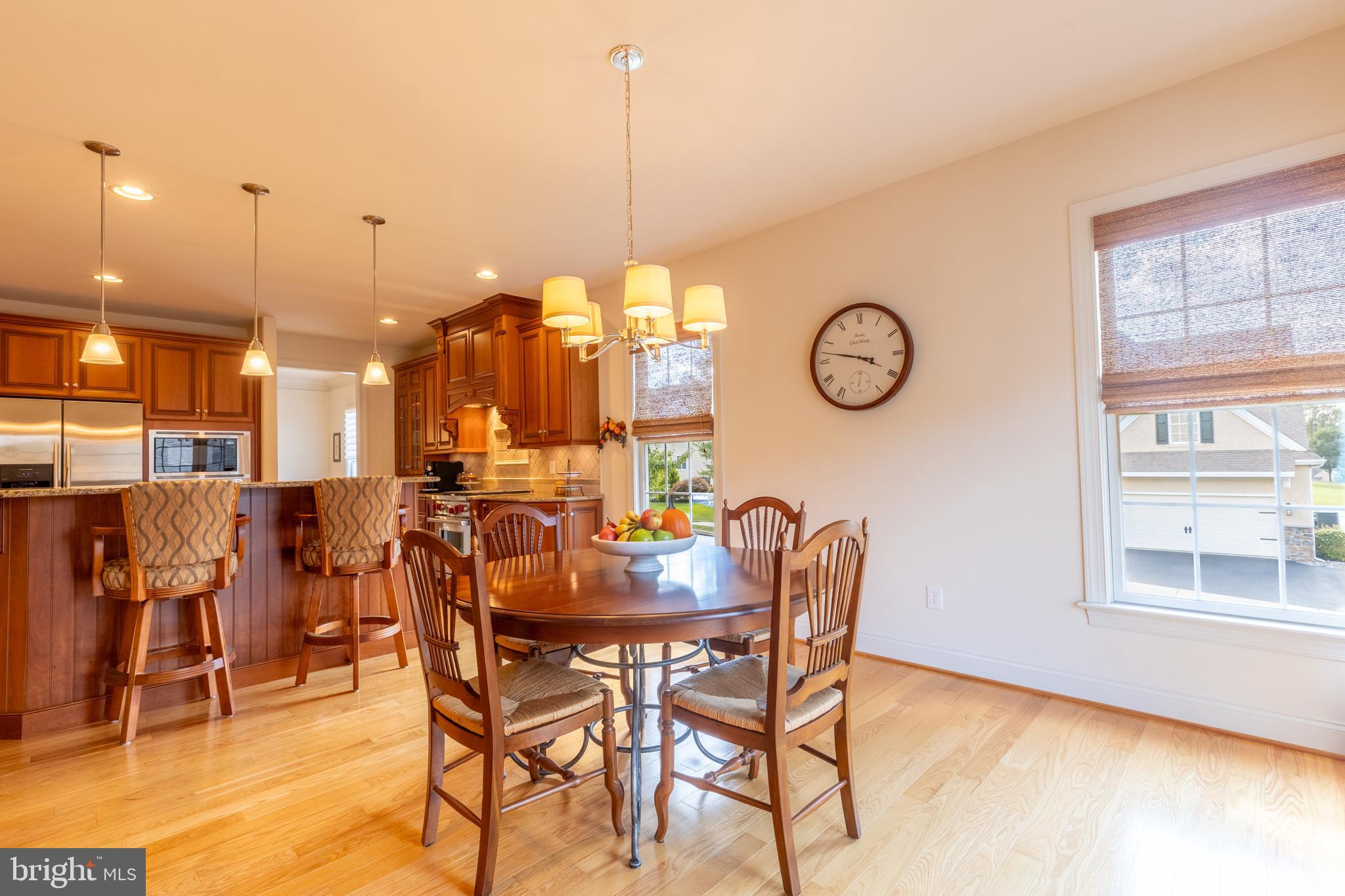 101 Cornwall Road, Unit 116 Landenberg, PA 19350 - Photo 12 of 30 a view of a dining room with furniture and wooden floor