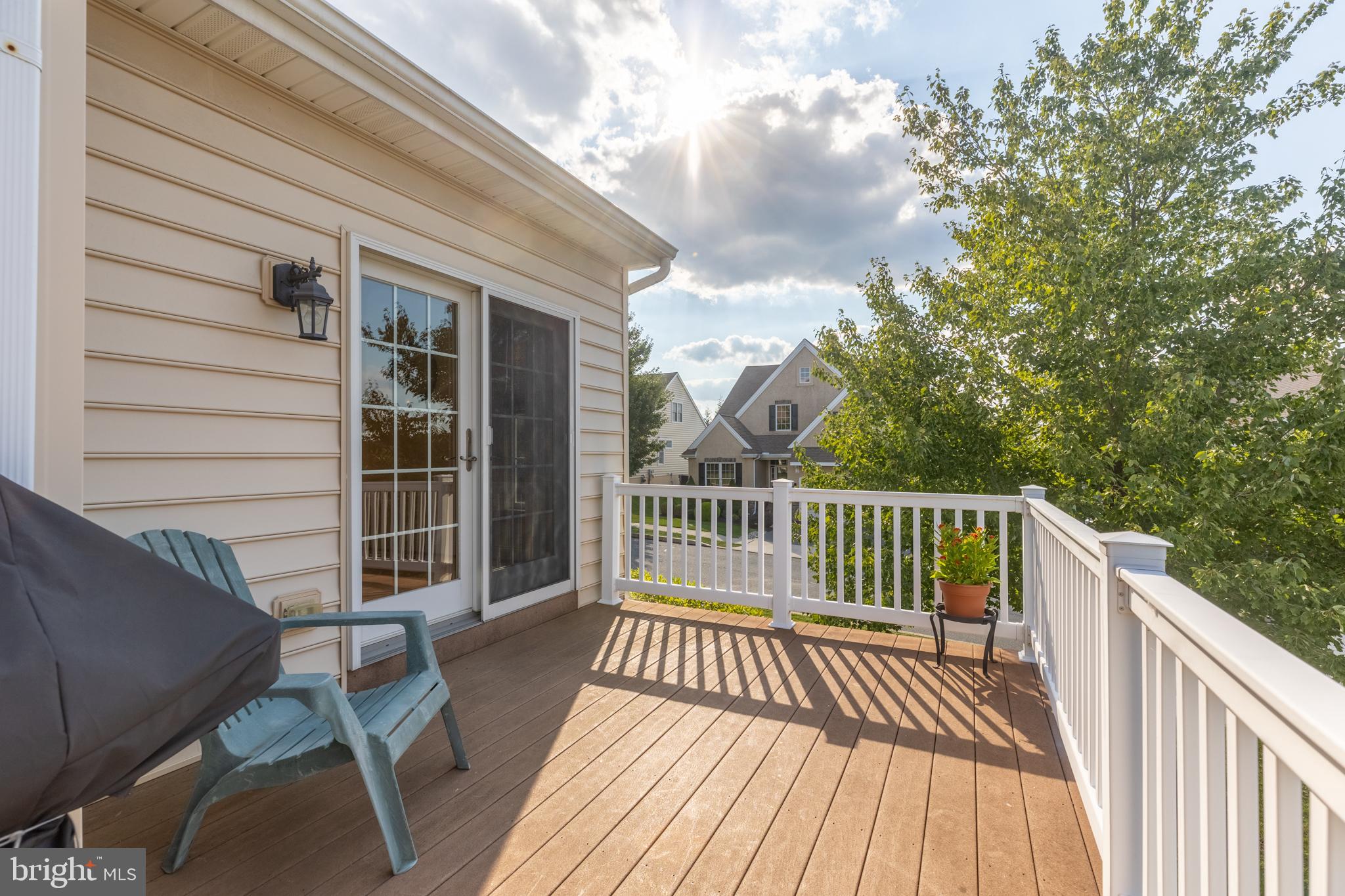 101 Cornwall Road, Unit 116 Landenberg, PA 19350 - Photo 16 of 30 a view of balcony with wooden floor and fence