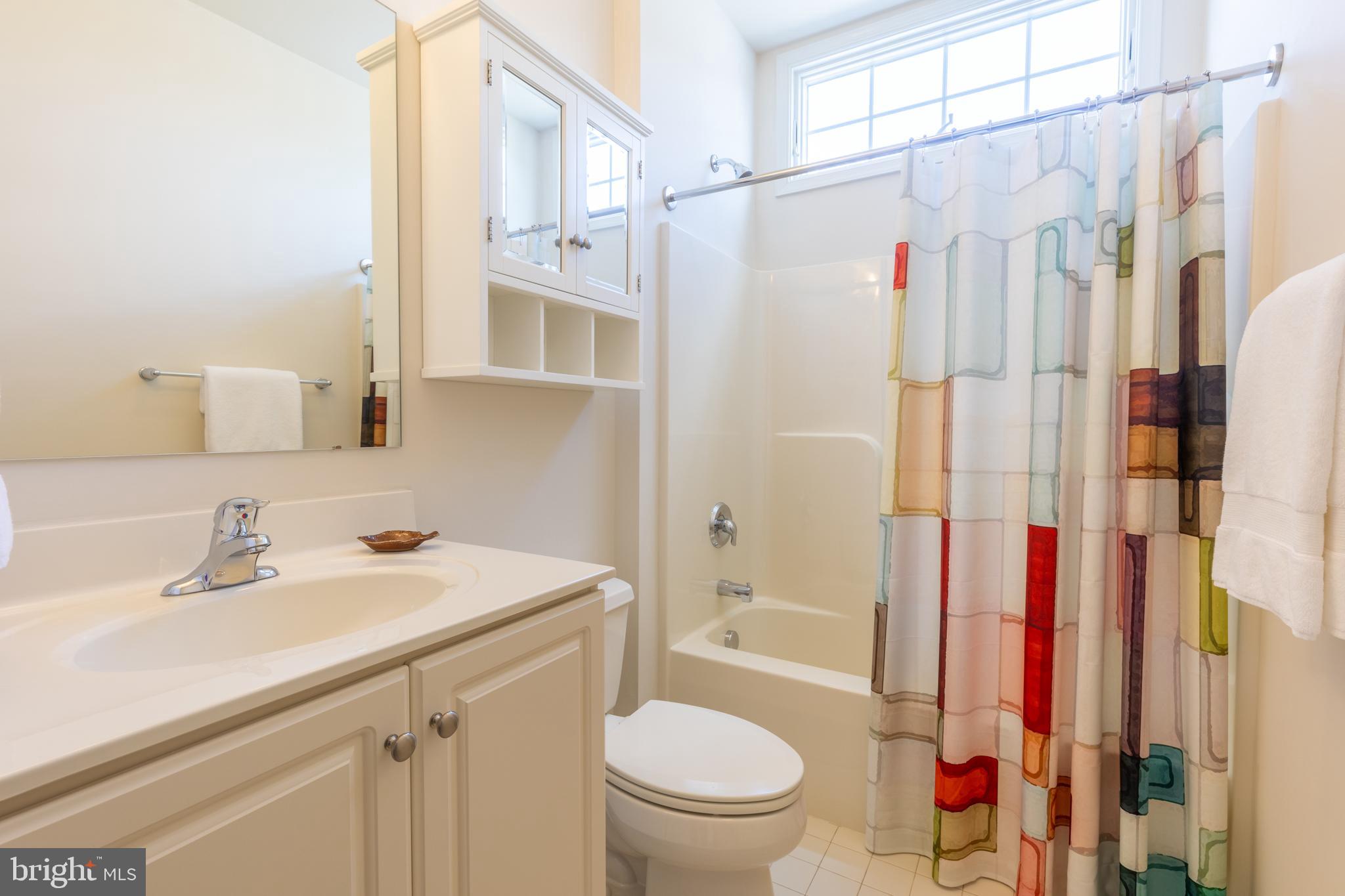 101 Cornwall Road, Unit 116 Landenberg, PA 19350 - Photo 26 of 30 a bathroom with a sink toilet and shower