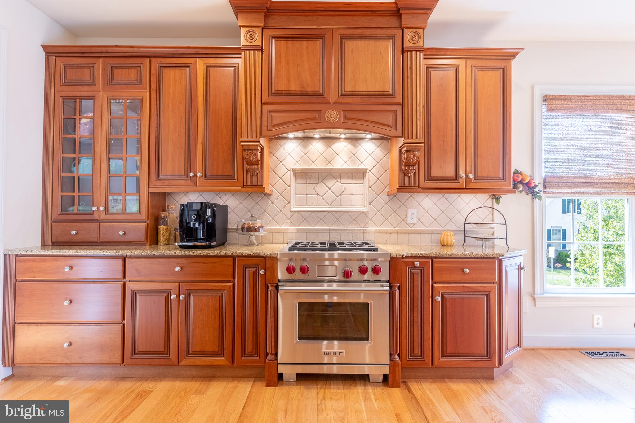 101 Cornwall Road, Unit 116 Landenberg, PA 19350 - Photo 10 of 30 a kitchen with stainless steel appliances granite countertop a stove a sink and a microwave
