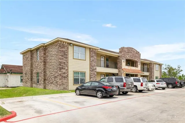 a car parked in front of a house