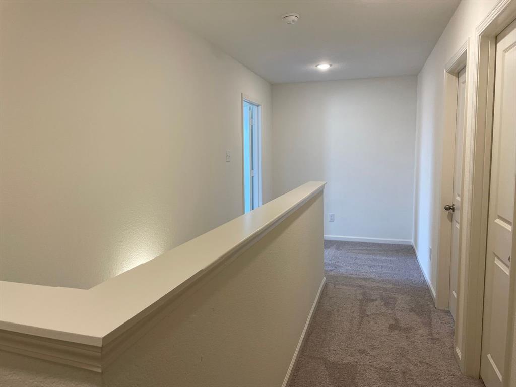 1911 Chapel Hill Road Princeton, TX 75407 - Photo 8 of 14 a view of hallway