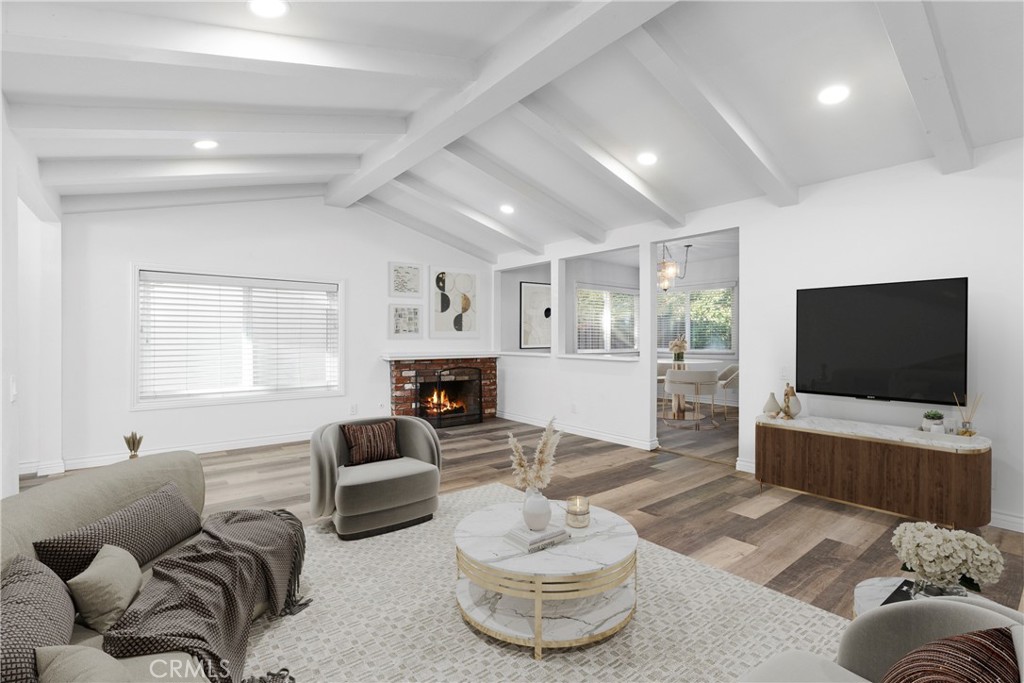 7 Chattanooga Irvine, CA 92620 - Photo 9 of 24 a living room with furniture and a flat screen tv