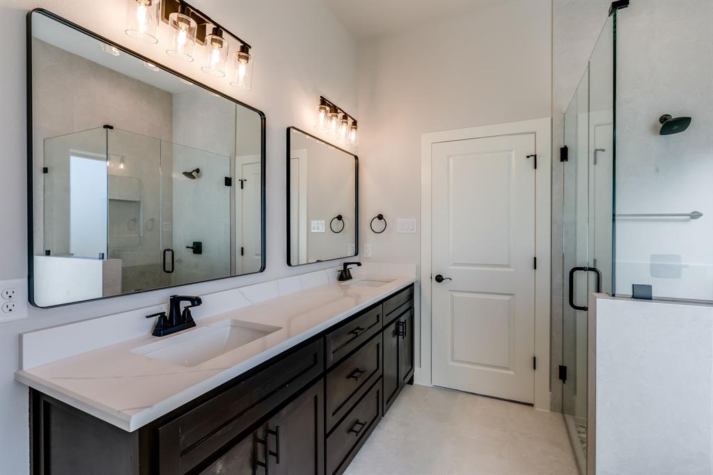 7017 Rnch Vw Place Springtown, TX 76082 - Photo 17 of 38 a bathroom with a sink double vanity