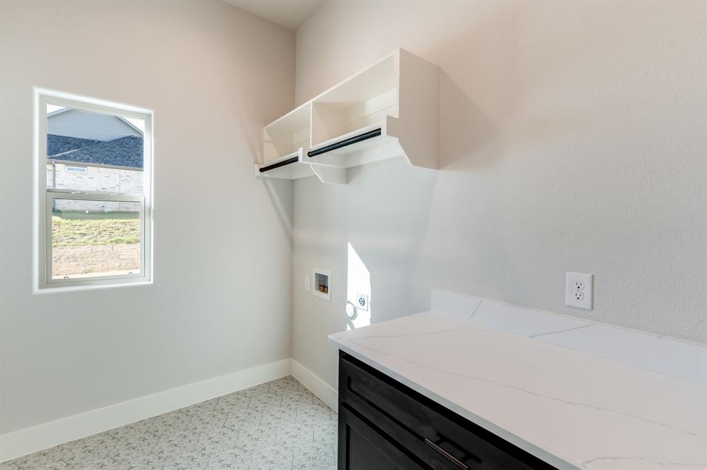 7017 Rnch Vw Place Springtown, TX 76082 - Photo 22 of 38 a room with a bed and a window