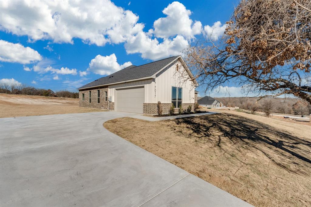 7017 Rnch Vw Place Springtown, TX 76082 - Photo 5 of 38 a view of a house with a yard