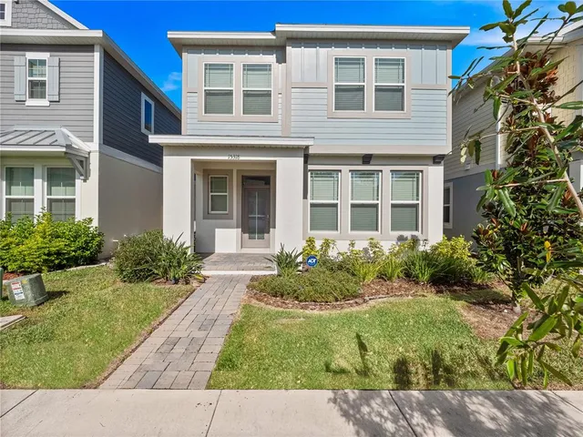 a front view of a house having yard