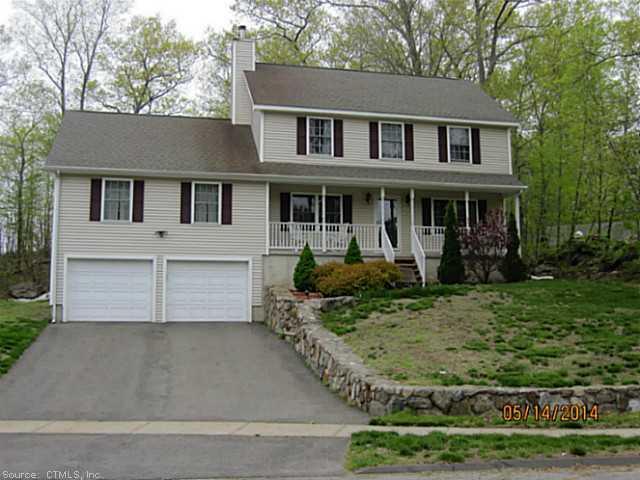 107 Donovan Road Naugatuck, CT 06770 - Photo 1 of 1 front view of a house with a yard
