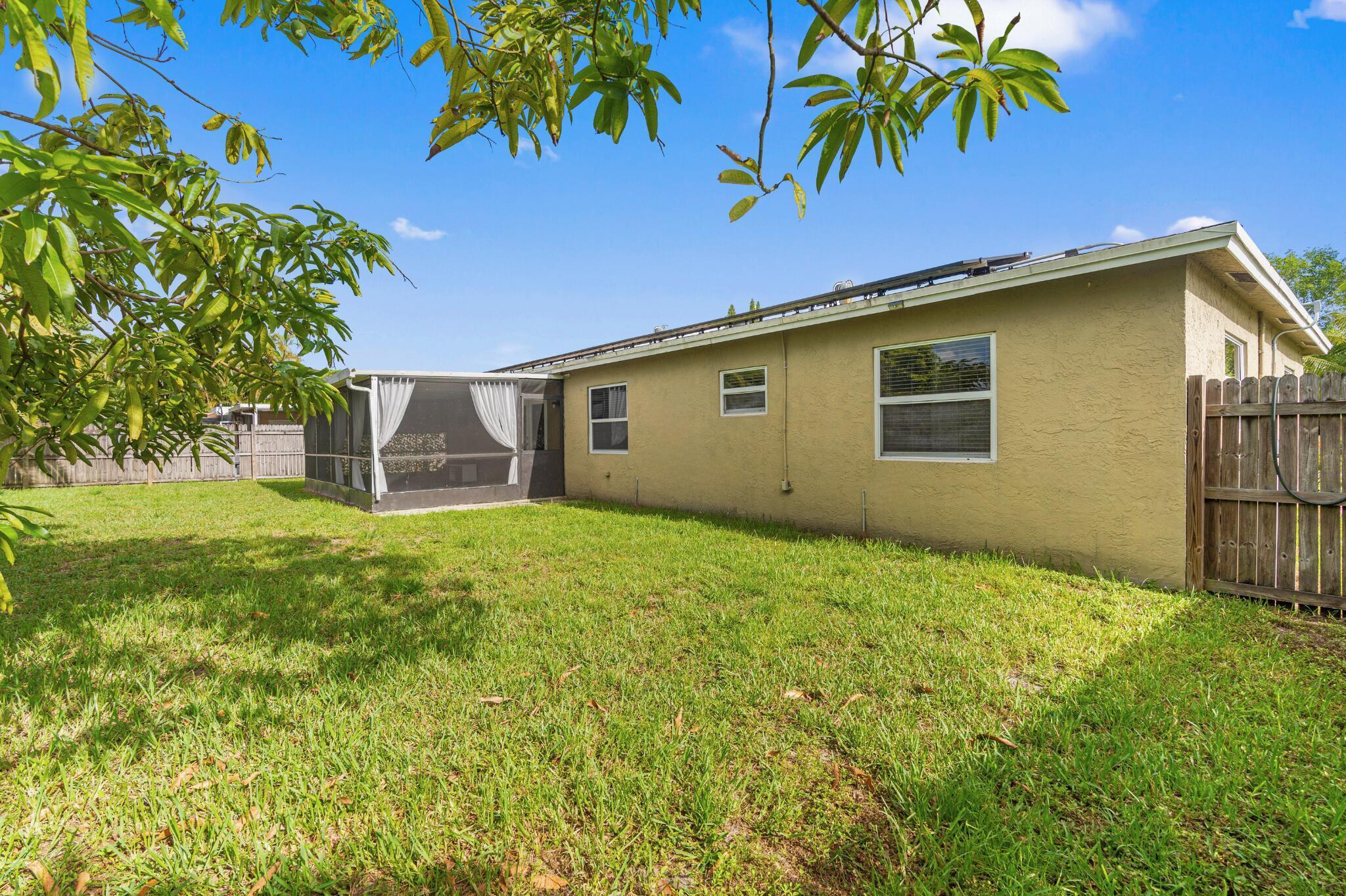 4784 Alfresco Street Boca Raton, FL 33428 - Photo 14 of 34 Fenced-in Backyard