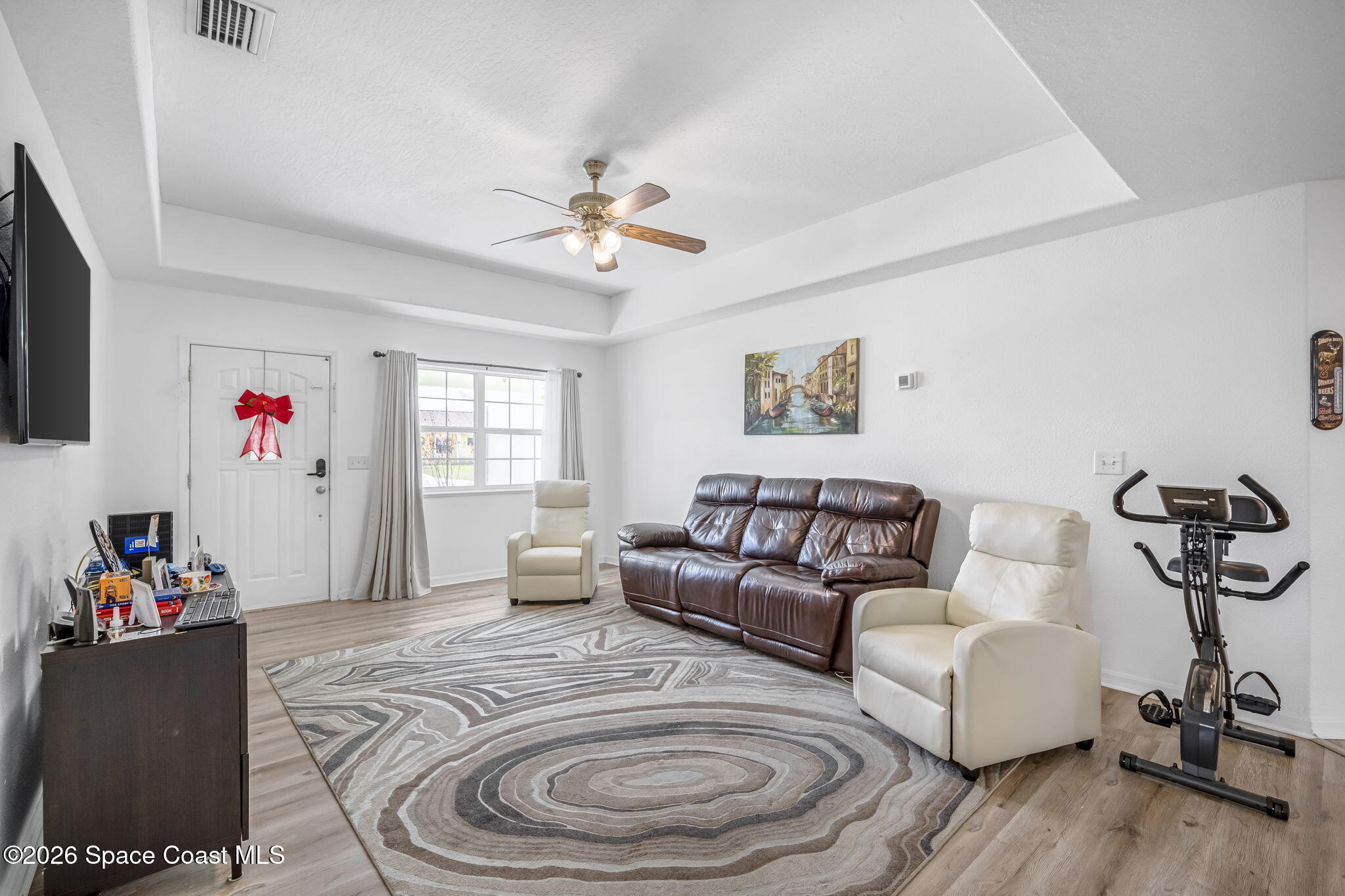 3404 Kilbee Street Mims, FL 32754 - Photo 7 of 30 a living room with furniture and a window