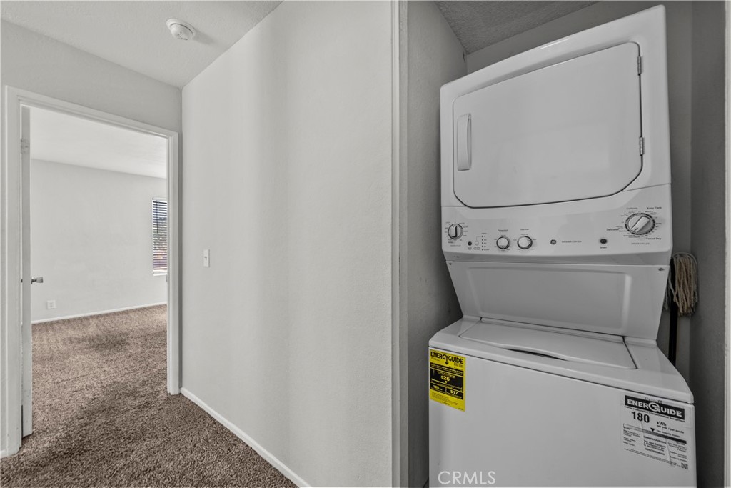 2554 Olive Drive, Unit 116 Palmdale, CA 93550 - Photo 18 of 26 a utility room with dryer and washer