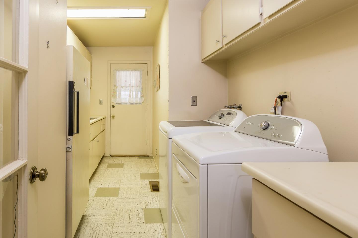 91 Marsh Road Atherton, CA 94027 - Photo 13 of 20 a utility room with dryer and washer