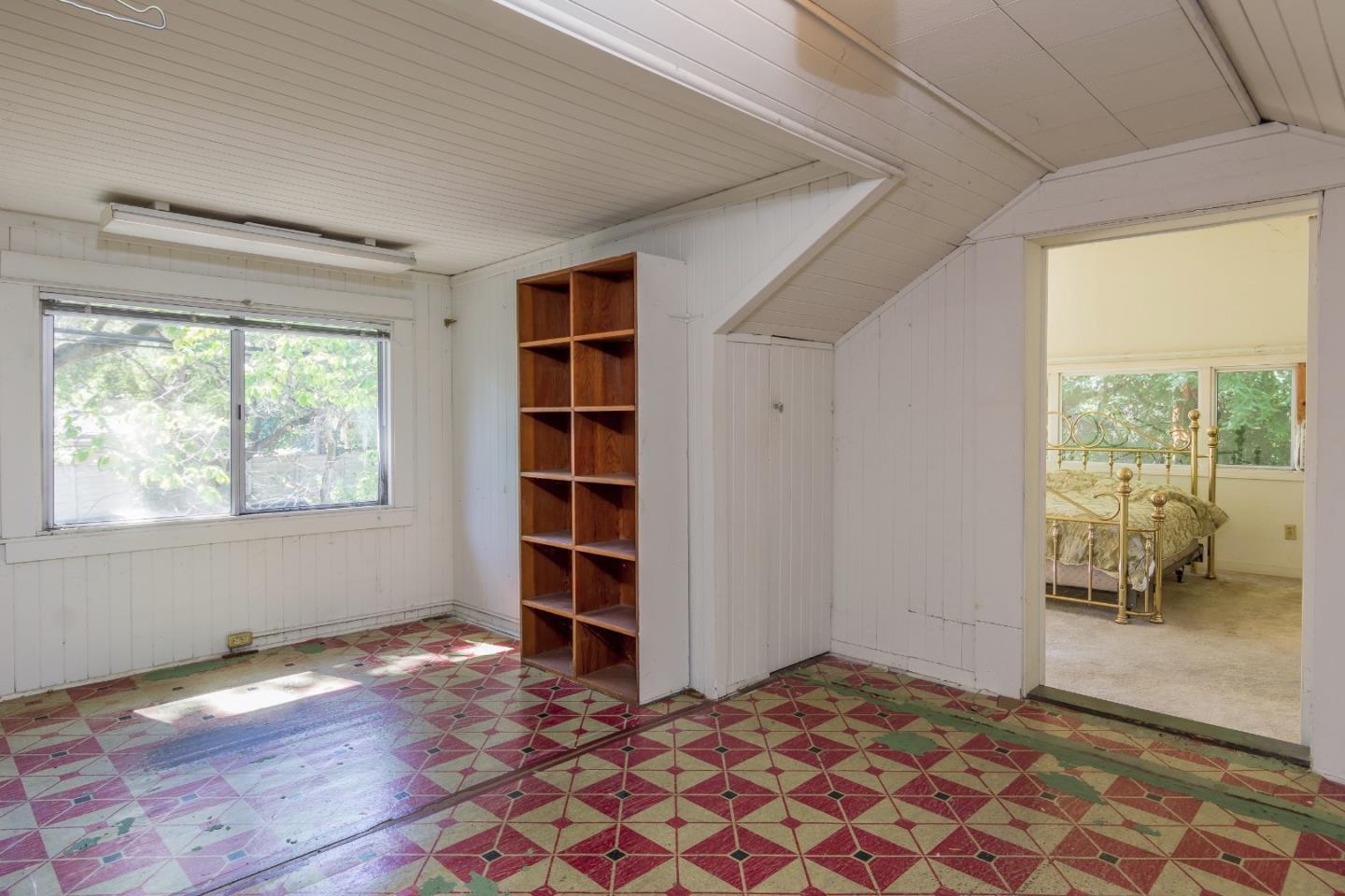 91 Marsh Road Atherton, CA 94027 - Photo 14 of 20 a view of a room with wooden floor and windows